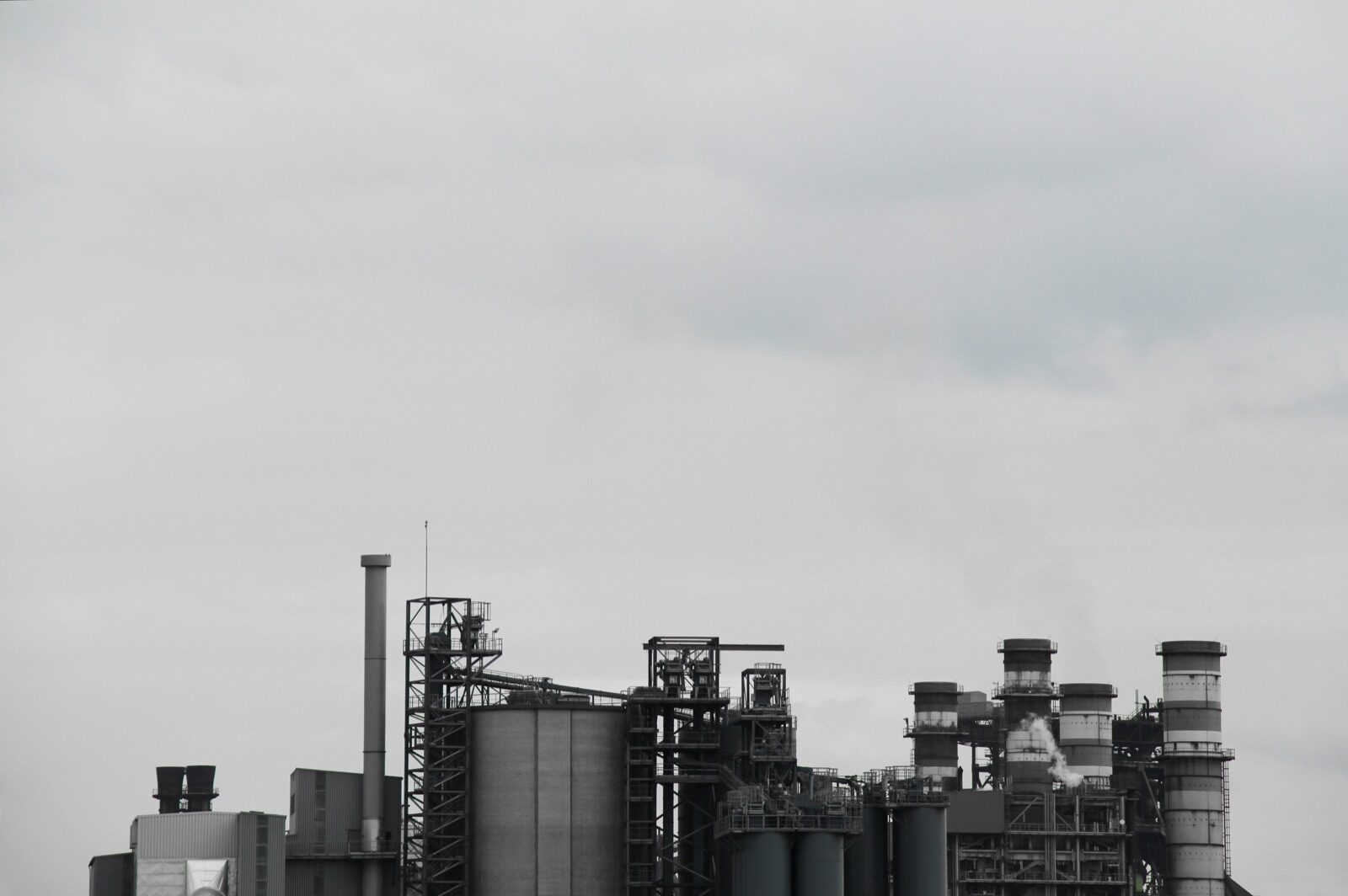 Gray concrete factory exterior for Epo-Weld™ HSS high strength structural epoxy tank lining and impeller repair